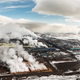 Illustration for article titled Worlds northernmost big city is a brutal mosaic of color and pollution
